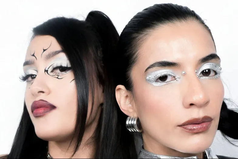 Two athletes wearing Tripped eye stickers